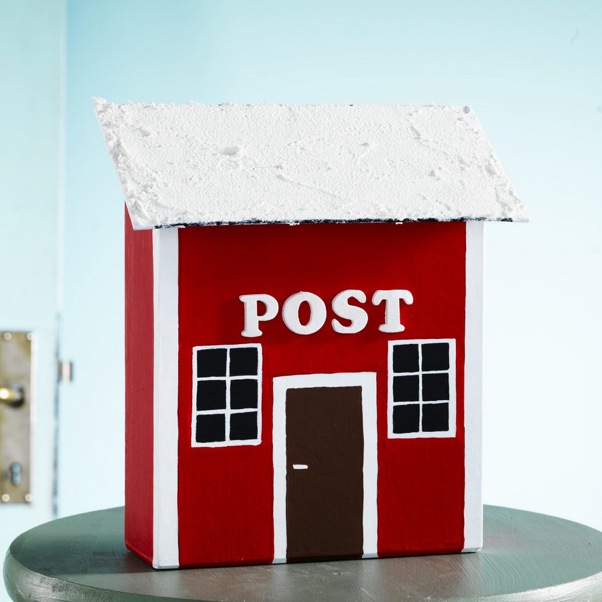 Mal en indendørs postkasse