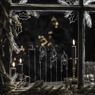 Tegn julemotiver på vinduer